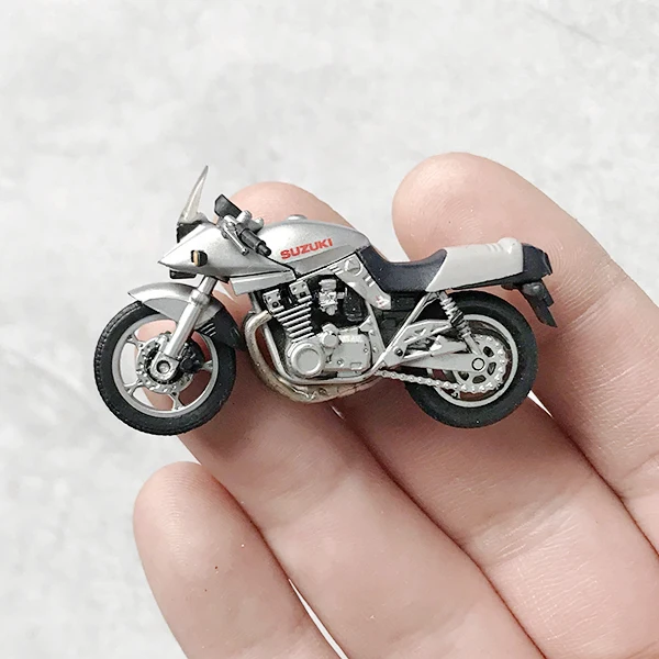 uccccc 1/42 super mini plástico motocicleta modelo mini brinquedo cor de prata